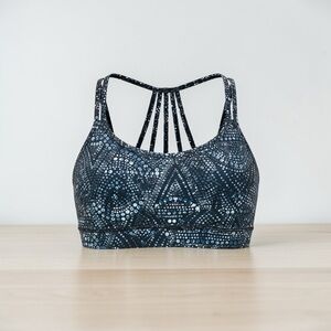 GAIAM Strappy-Back Sports Bra in Black & Blue Dot Print